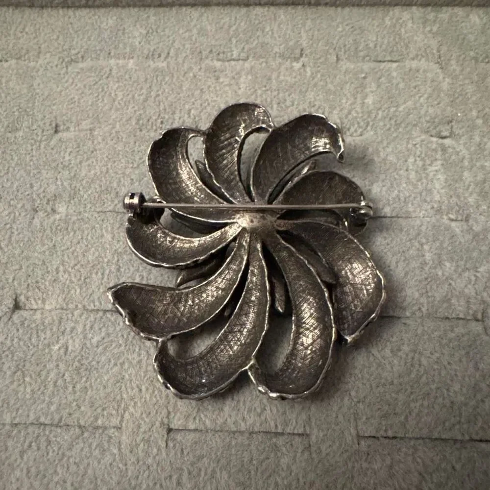 Source Unknown silver toned